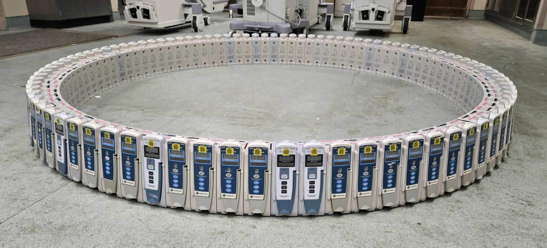91 Alaris 8100 IV pumps arranged in a perfect circle